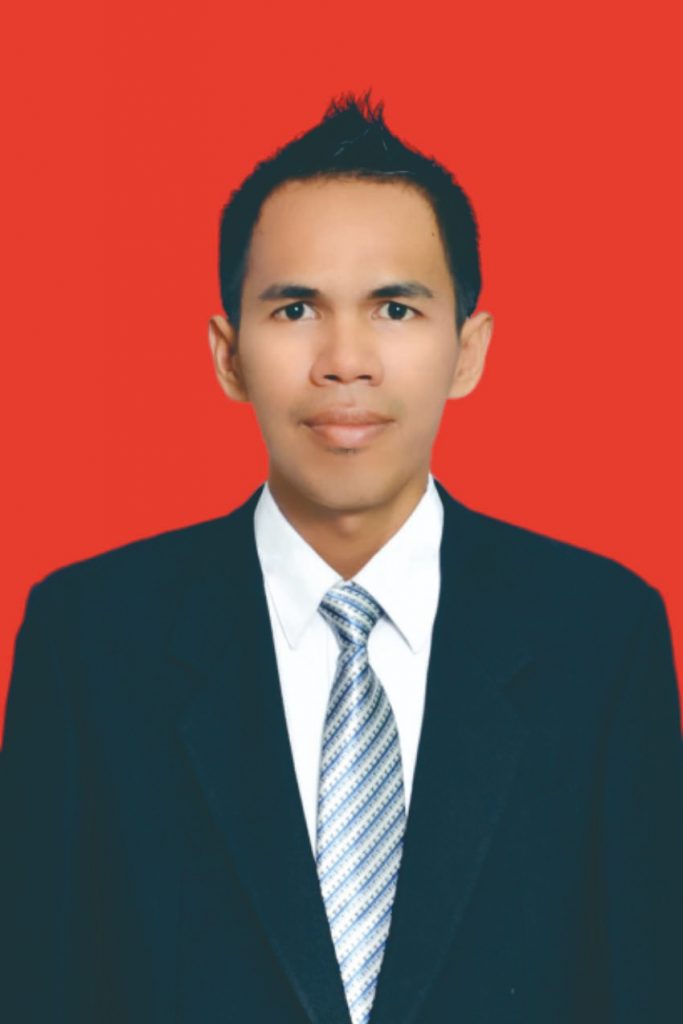 Rezki Fauzi, S.Kom, M.Kom